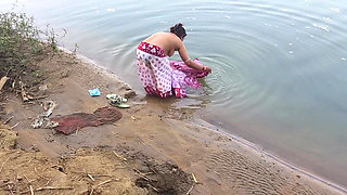 Indian Village Wife Bathing in the River in Outdoor Area