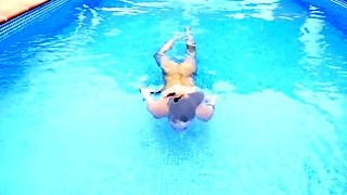 Small-Titted Brunette Amateur Blowjob by the Pool