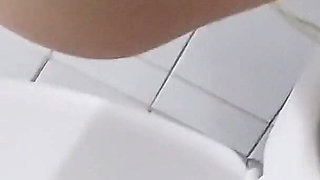 Peeing in a Public Bathroom