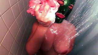 Big boobed Memphis masturbates in a bodystocking