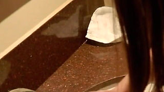 Student Taking A Piss on the Toilet