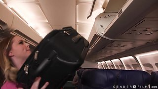 Horny shemale stewardess Ariel Demure pleases the pilot with her blowjob and comforts a busty passenger with her dick