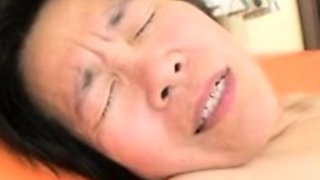 Asian bitch sucks small erect cock