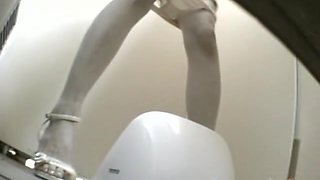 Hidden cam records pussies in a public toilet