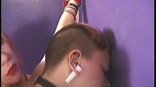 Two mistresses tweak bdsm fattie's boobs and whip her ass