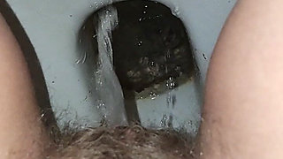 Big Load of Pee From Hairy Pussy