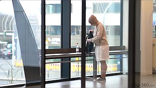 Lewd hussy shows her boobs in public