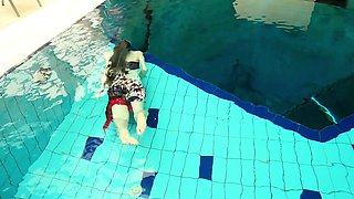 Hot Polish redhead swimming in the pool