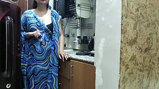 Indian Stepmom Watches and Enters Her Stepson's Kitchen to Fuck Him