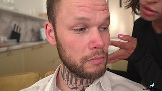 Hot skinny MILF rides a cock on a sofa in her tight black dress