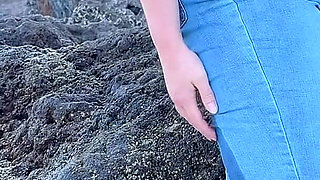 Peeing in Tight Jeans on the Beach