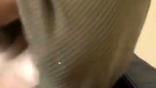 Long Nipples Peeking Through a Green Jumper