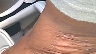 Barefoot Passenger Blue Toes Foot Play While Riding in the Car