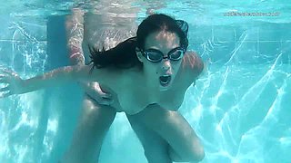Naughty amateur GF in swim glasses is busy with sucking dick