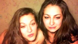Alike looking svelte and happy brunette lesbos kissed and fingered cunts