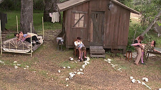 Lusty sluts are sucking and fucking two guys outdoors