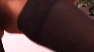 Sexy Brunette Plays with a Sex Toy