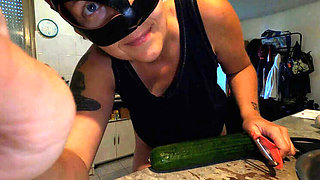 Hot French MILF Kahann masturbates with cucumber in kitchen close-up amateur video