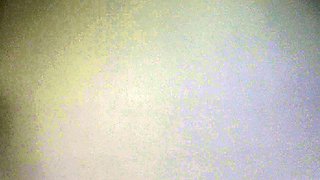 Brunette solo masturbation on the couch