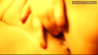 Milf moans in pleasure as she strokes her hard clit