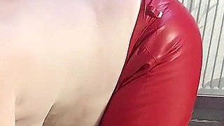 Busty Granny Teases with Massive Tits in Red Leather