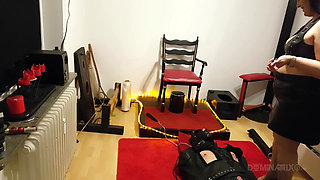 Curvy Brunette Dominatrix Commands Bound Slave in Fetish Dungeon