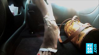 sexy feet & high heels in car