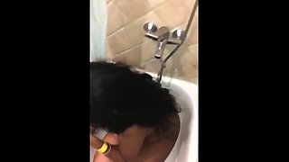 Amateur ebony slut gets covered in hot piss in the shower