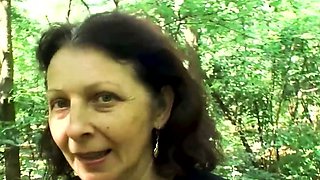 Hairy pussy granny fucks in the woods