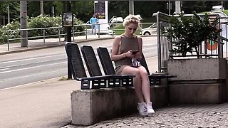 Pantyless babe teases with upskirt of teen pussy in public