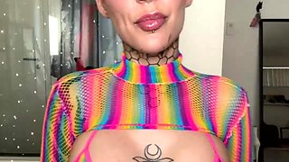 Inked Hottie with Buns Teases in Shiny Rainbow Mesh Top