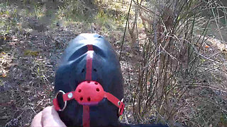 Outdoor sex in the wood. Wearing sexy clothes and high heels, bound, throated and fucked