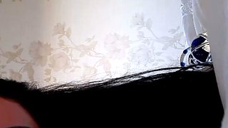 Brunette solo masturbation on the couch