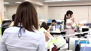 Horny Japanese babes getting fucked together in the office