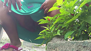 Hot BBW of hairy pussy pissing behind the bush