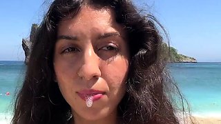 Walking with hot cum on my face on a public beach full of
