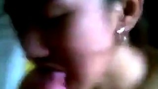 Asian College Girl Gives a Blowjob and Swallows