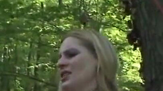 Humiliating whipping kneeling on the lake shore