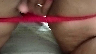 My girlfriend in a red thong is going wild with pleasure and telling me to put it all in.