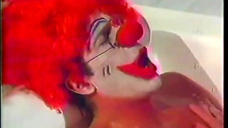 Sexy brunette with a fantastic ass loves doggy style fucking from a clown