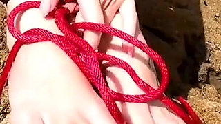 Ocean Rope Bondage with Ballgag in Wetsuit