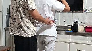 Banging the maid from behind in the kitchen.